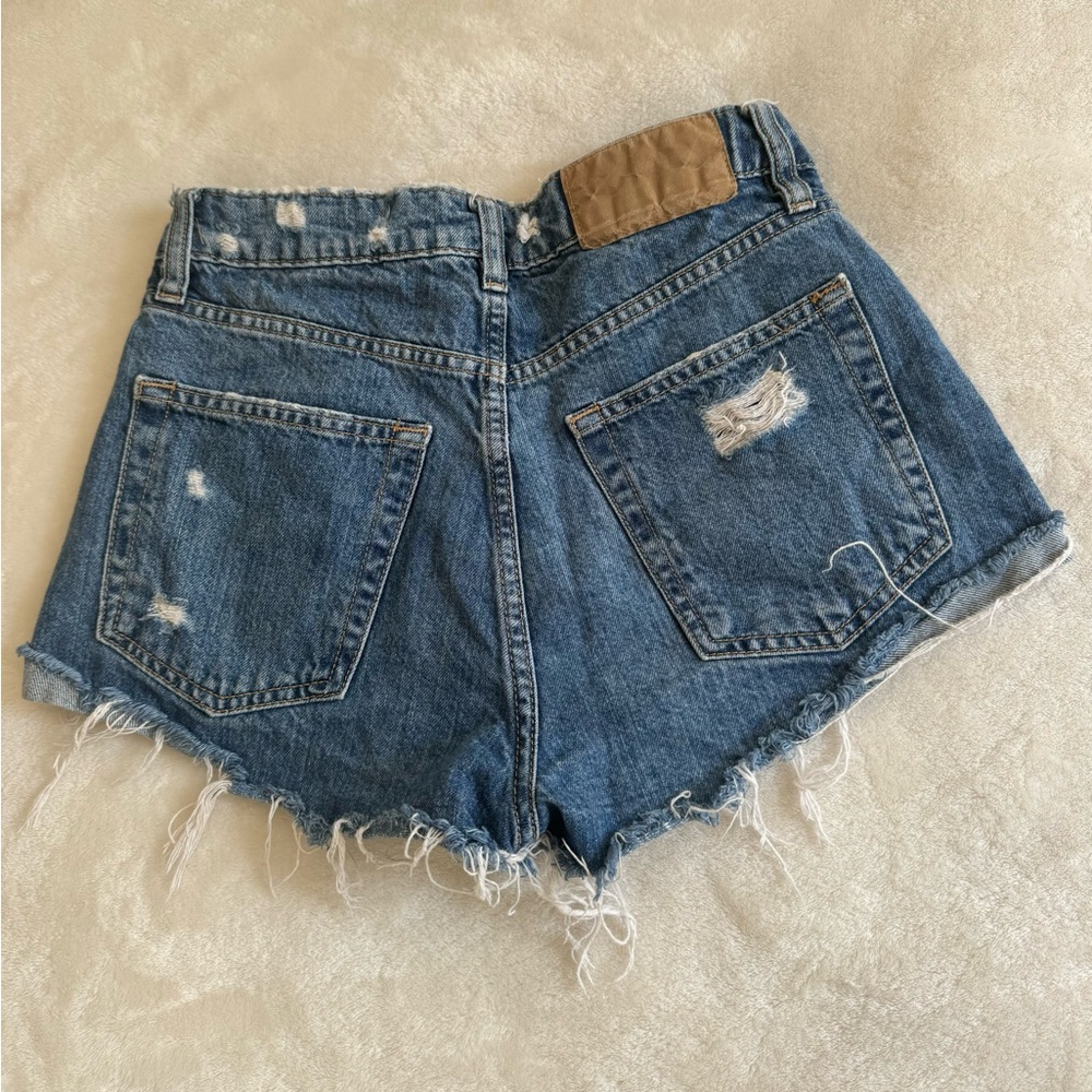 Distressed denim shorts